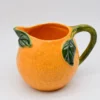 Carafe en céramique en forme d'orange