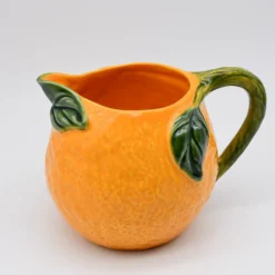 Carafe en céramique en forme d'orange
