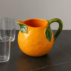 Carafe en céramique en forme d'orange