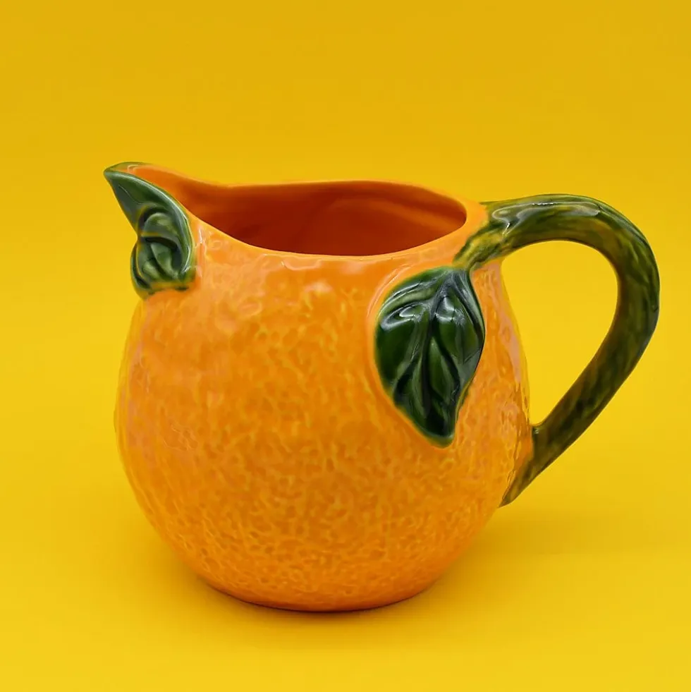 Carafe en céramique en forme d'orange