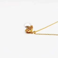 Collier de perle et filigrane d'argent doré