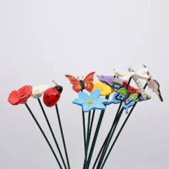 Fleurs et papillons artificiels en céramique