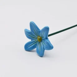 Fleurs et papillons artificiels en céramique