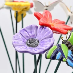 Fleurs et papillons artificiels en céramique