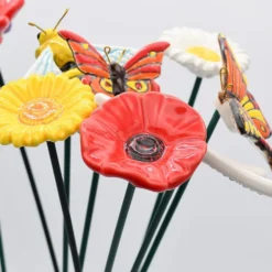 Fleurs et papillons artificiels en céramique