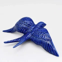 Hirondelle de Caldas da Rainha en céramique bleue