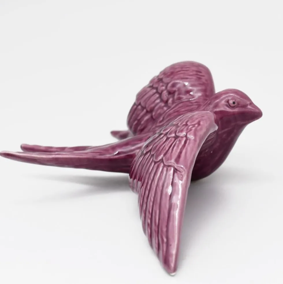 Hirondelle de Caldas da Rainha en céramique mauve