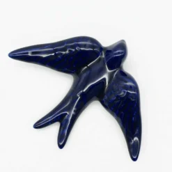 Hirondelle lisse en céramique bleue