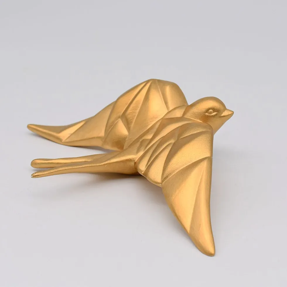 Hirondelle stylisée en céramique - Doré