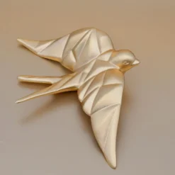 Hirondelle stylisée en céramique - Doré