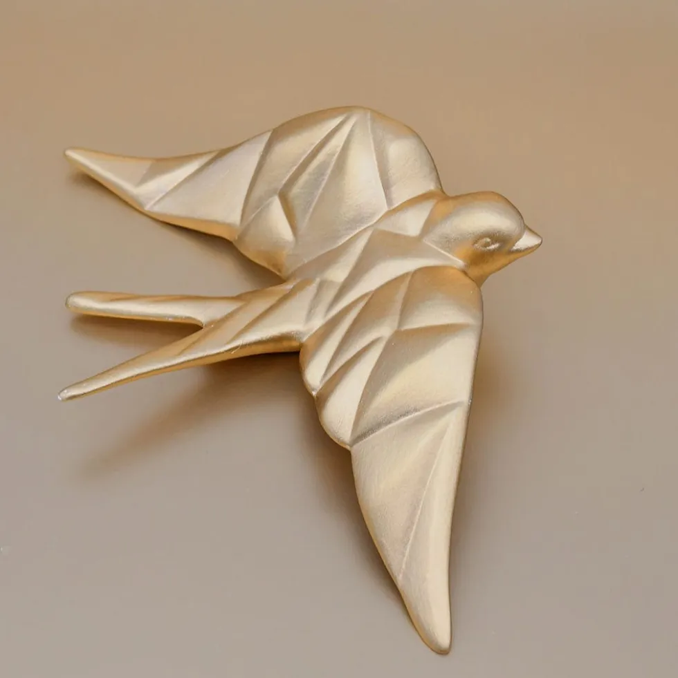 Hirondelle stylisée en céramique - Doré