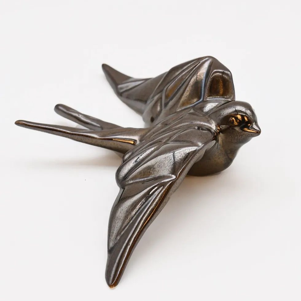 Hirondelle stylisée en céramique - Bronze