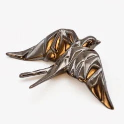 Hirondelle stylisée en céramique - Bronze