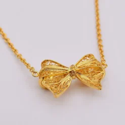 Laço I Collier en argent doré