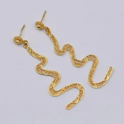 Serpente I Boucles d'oreille en argent doré - 6cm